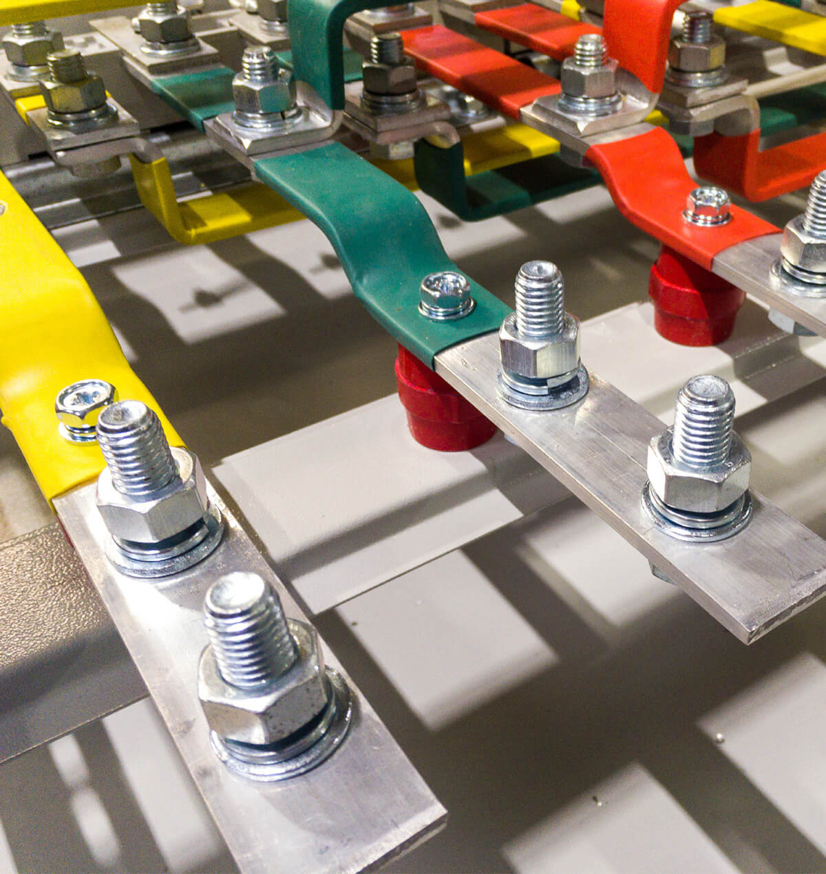 colorful coated metal bars bolted to frames