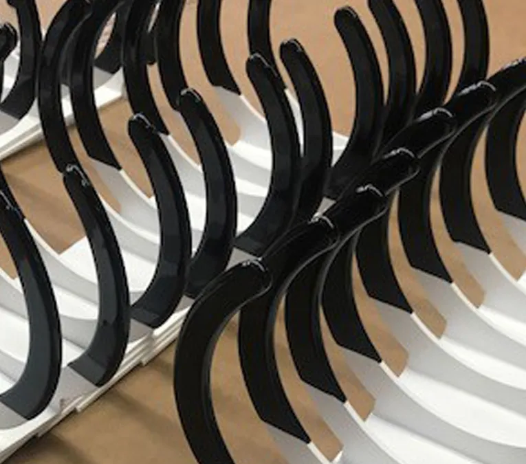 metal curved parts coated with black metal curved parts coated with black